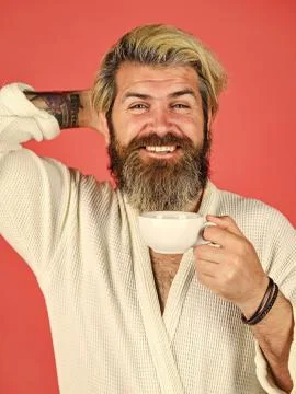Guy in domestic clothes hold coffee cup. Bearded man with mug. Breakfast concept Stock Photos