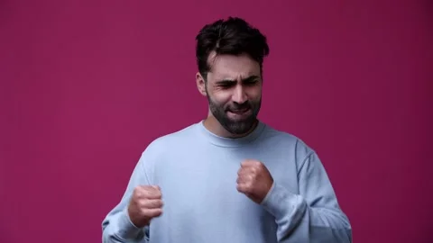 A guy dressed in a blue leotard dancing for the camera Stock Footage 162843324