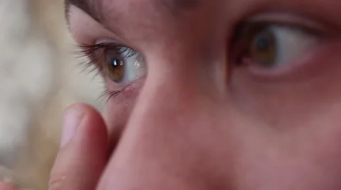 The guy dresses lenses. Video stock 48421667