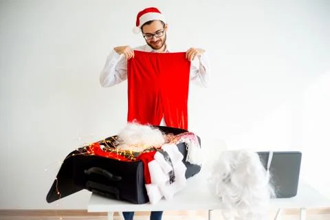 Guy dressing up as Santa Claus Stock Photos