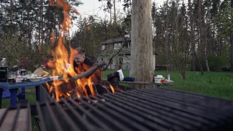 The guy drinks beer and laughs at the table. Stock Footage 277108003
