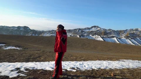 The guy drinks tea in the mountains in the morning Stock Footage 237216416