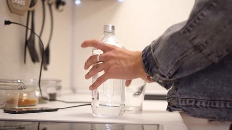 The guy drinks water. Video stock 107860659