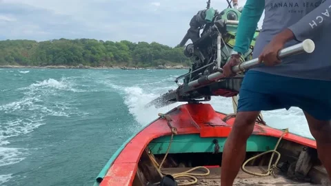 Guy drives a boat during a small storm. Stock Footage 236693519