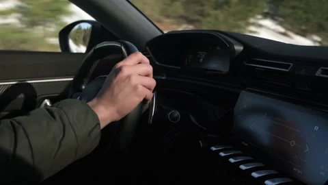A guy is driving a car, a man is driving a car Stock Footage 237538559