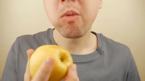Guy Eating A Big Apple Stock Footage 151218919