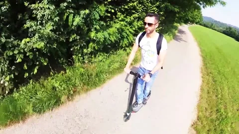 A guy on an electric scooter Video stock 138511144