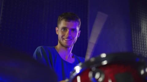 The guy emotionally plays the drums. Close up Stock Footage 200222715
