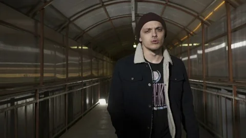 Guy emotionally reads rap and looks at the camera Stock Footage 80479557