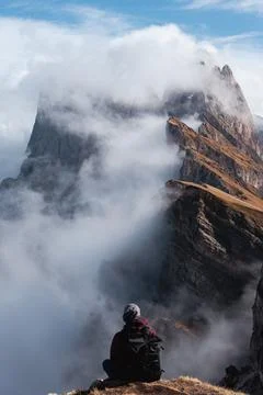 A guy in enjoying the view of the Seceda mountain Stock Photos