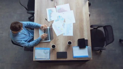 Guy entering data on computer Stock Footage 103099417
