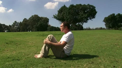 Guy exercising abdominal muscles Stock Footage 20510199