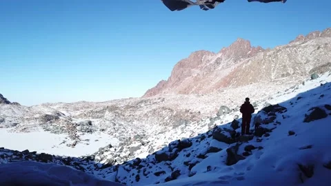The guy explores the ice cave. A dangerous place. Stock-Footage 145258132