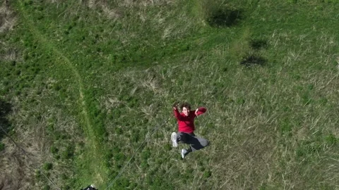 A guy falls from a height, a man falls, a man falls from a roof, slow motion Stock-Footage 249410707