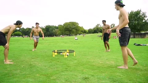 Guy Falls While Playing Spikeball Stock Footage 156872178