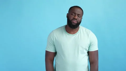 Guy feel bad overworked isolated blue color background Stock Footage 167691480