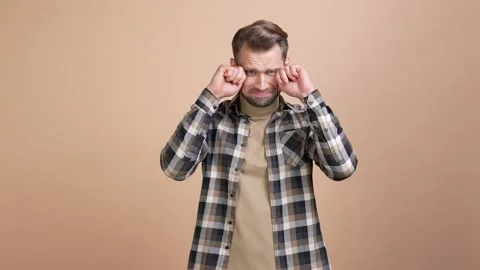 Guy feel lonely weeping sob isolated pastel color background Stock Footage 176788510