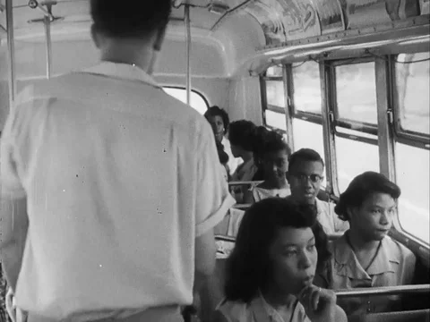 Guy finds an empty seat in a bus but chooses not to sit in it - 1956 Stock Footage 95180136