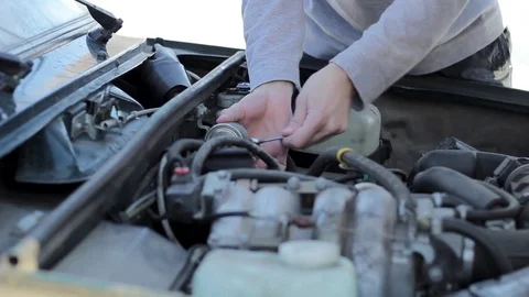 The guy fixes the car breakdown Stock Footage 85089676