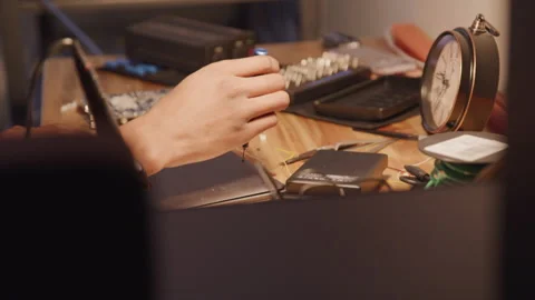 Guy Fixing Electronics On Desk Stock Footage 210220655