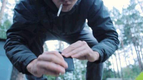The guy found the phone among the rocks Stock Footage 113859387