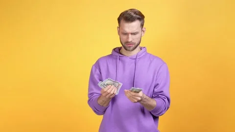 Guy get profit wrong money number isolated vibrant color background Stock Footage 169511503