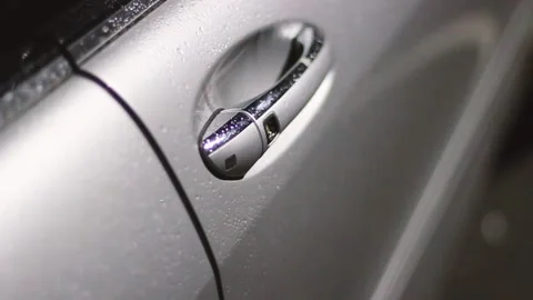 The guy gets into the car in the evening. Stock Footage 130738149