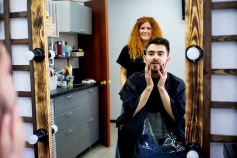 Guy gets a haircut Stock Photos