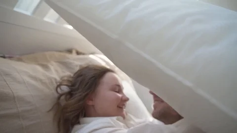 The guy with The girl in the bed Stock Footage 127446574