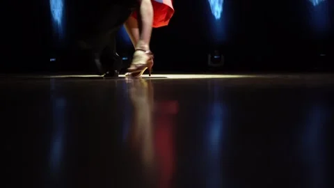 A guy with a girl dancing tango, attention to his feet. Stock Footage 159370201
