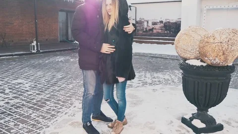 Guy with a girl is standing and hugging Stock Footage 80533046