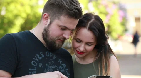 Guy girl with tablet Stock Footage 50980817