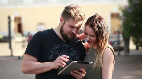 Guy girl with tablet Stock Footage 50981137