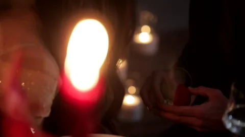 The guy gives a wedding ring Stock Footage 235889040