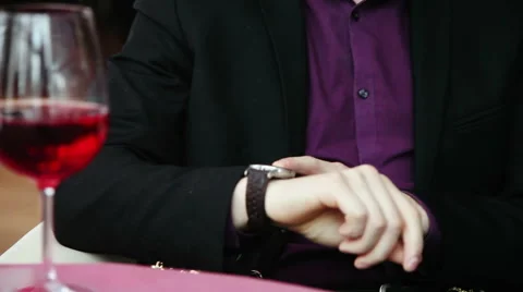 A guy with a glass of wine is talking in a restaurant at a business meet Stock Footage 45785012