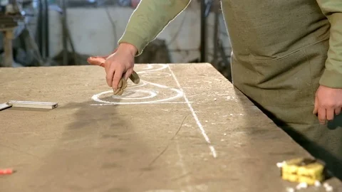 Guy glove remove oval patterns on the table Stock Footage 76391764