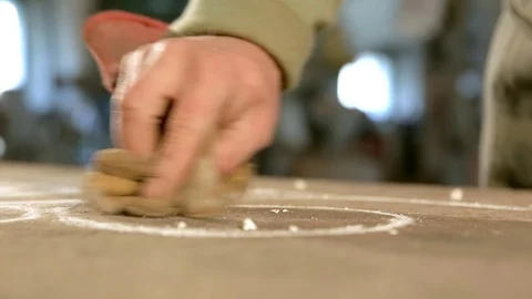 Guy glove remove oval patterns on the table Stock Footage 76391984