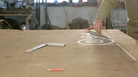 Guy glove remove oval patterns on the table Stock Footage 77003601