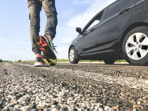 The guy go to the car Stock Photos
