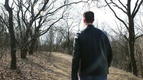 A guy goes into a dark forest 動画素材 48931351