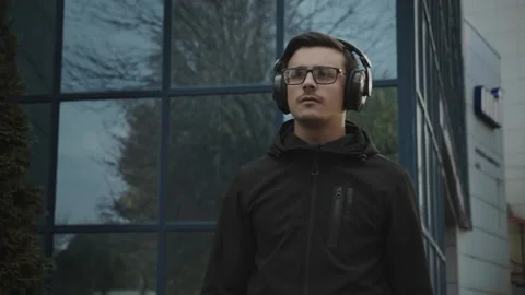 The guy goes in the headphones. Stock Footage 131734301