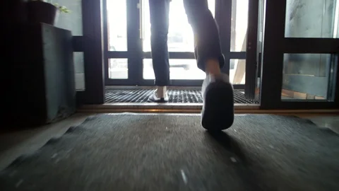 The guy goes outside in slippers in the winter Stock Footage 129400857
