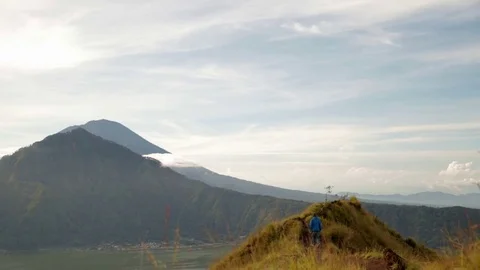 Guy is going and staying on the top of the mountain. Video stock 82147633