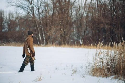 Guy is going to the forest for hunting Stock Photos