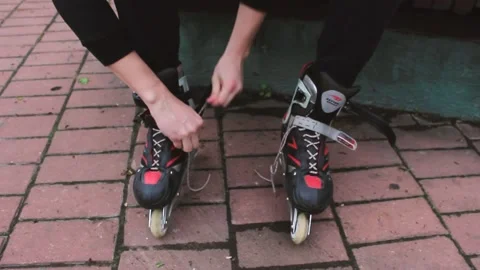 Guy is going to roller skate in the park Stock Footage 130736952