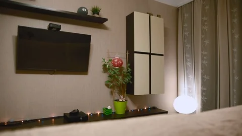 The guy is going to watch TV. Average plan Stock Footage 87403561