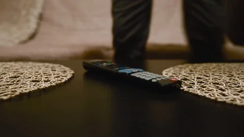 The guy is going to watch TV. close up Stock Footage 87403420