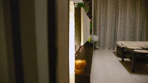 The guy is going to watch TV. General plan Stock Footage 87403350