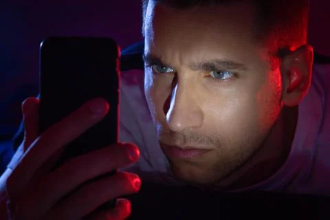 The guy got a security alert on his phone. Alarm button. Danger. Security W.. Stock Photos