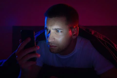 The guy got a security alert on his phone. Alarm button. Danger. Security W.. Stock Photos